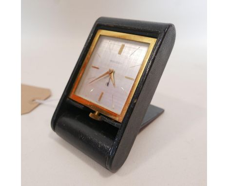 A Jaeger-LeCoultre 8-day travel alarm clock, H.11 W.6.5cm 