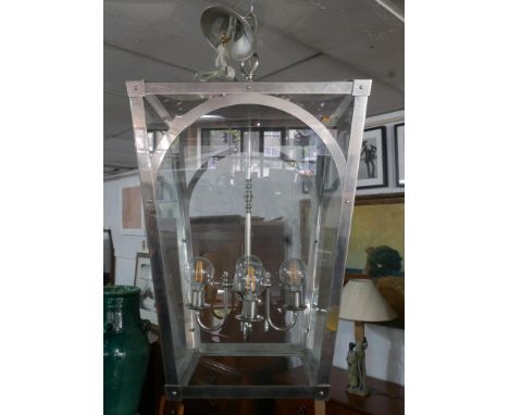 A large contemporary chrome and glass ceiling lantern with Edison style light bulbs, H.98 W.62 D.62cm 