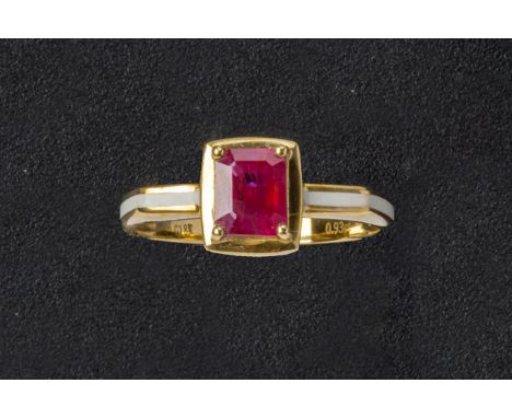 A RUBY SINGLE STONE RING
Set in 18k gold with a step cut single stone ruby and enamel decorated shank
US size 6.25
2.3g
Condi