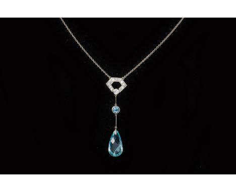 AN ART DECO STYLE AQUAMARINE AND DIAMOND PENDANT NECKLACE
Set in platinum, the milgrain set hexagonal diamond pendant above a