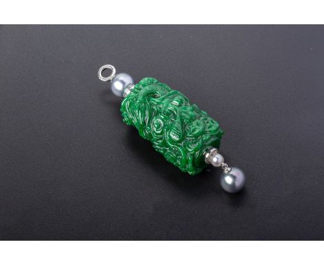 A CARVED JADE AND TAHITIAN PEARL PENDANT
Set in 18k white gold, the jade carved with dragons and Buddhist emblems
6cm high
20