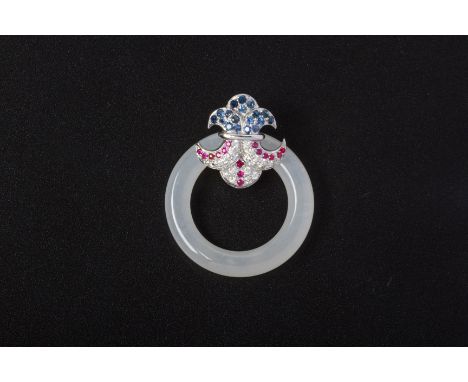 A WHITE NEPHRITE JADE, SAPPHIRE AND RUBY PENDANT
Set in unmarked white gold, the pave set sapphires, rubies and diamonds in t