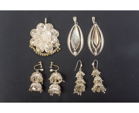 A GROUP OF ASSORTED WHITE METAL JEWELLERY
Comprising a filigree pendant, a pair of filigree earrings with mother of pearl, an