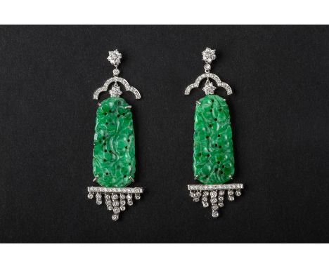 A PAIR OF CARVED JADE AND DIAMOND EARRINGS
Set in 18k white gold, the jade carved and pierced with round brilliant cut diamon