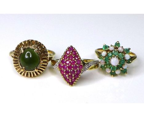 Private Collection-Vintage and Modern design rings: Three 9ct gold vintage rings, the first set with rubies in a diamond shap