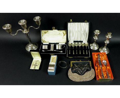 A group of silver items, comprising a pair of candlesticks, Birmingham 1968, W I Broadway &amp; Co, a three branch candelabru