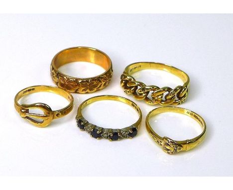 A group of five 9ct gold rings, including two formed as belts, both size I/J, and a band engraved with flowers, size M, 10.2g