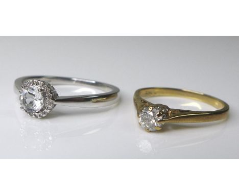 Two 9ct gold rings, the first a with a diamond solitaire of approximately 0.3ct, size K, 1.5g, the second in white gold, set 