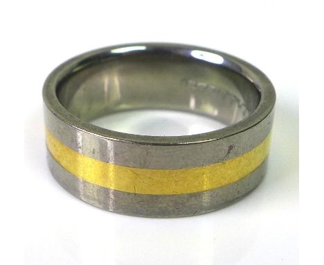 A titanium wide banded ring, with central band of yellow gold, engraved 'infinity' to the inside, size S, 5.9g. 