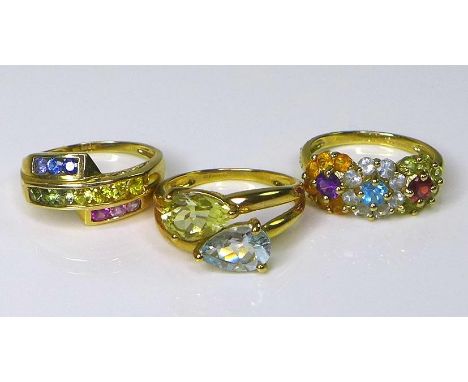 Private Collection-Vintage and Modern design rings: A group of three 9ct gold rings set with coloured gemstones, the first fo