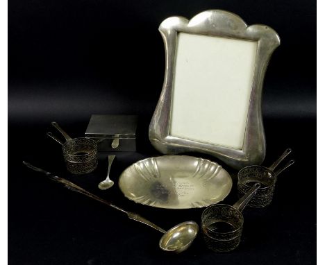 A group of silver and white metal, comprising a silver photograph frame with leather easel back, for image size 20 by 15cm, 3