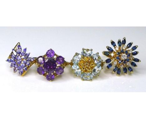Private Collection-Vintage and Modern design rings: Four 9ct gold flowerhead rings, one set with tanzanites, a second set wit