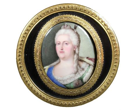 A gold and tortoiseshell snuff box, circa 1765, Louis XVI, of circular form, the lid set with a Berlin plaque of Catherine Em