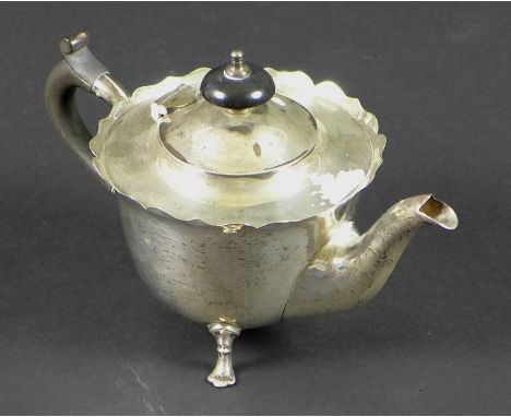 An early 20th century small silver teapot, with ebony handle and finial, Mappin and Webb, Sheffield, rubbed date mark, 8.7toz