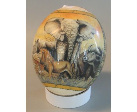 Ostrich egg with transfer printed decoration of the map of Africa with various African animals and figures.(B.P. 21% + VAT) B