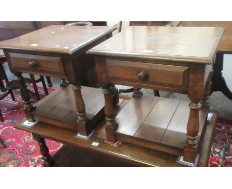 Modern oak rectangular coffee table on baluster turned legs and under tier, together with a pair of matching single drawer la