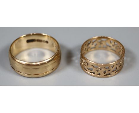 A 9ct gold ring and a 14ct pierced gold ring.  Ring size K and G.  Approx weight in total 5.4 grams.(B.P. 21% + VAT) 