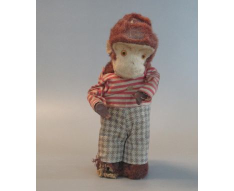 Vintage clockwork monkey.(B.P. 21% + VAT) Appears incomplete.