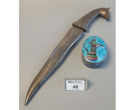 Two Middle Eastern/Persian items to include dagger with white metal sheath and 'bull head' handle, together with an oval cloi