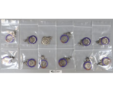 Collection of silver  sporting weightlifting fobs to include Welsh Amateur Weightlifters 1929-36, British Amateur Weightlifte