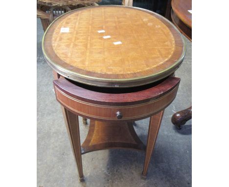 French Style parquetry  and guilt metal mounted oval lamp table with under tier on square tapering legs and spade feet.(B.P. 