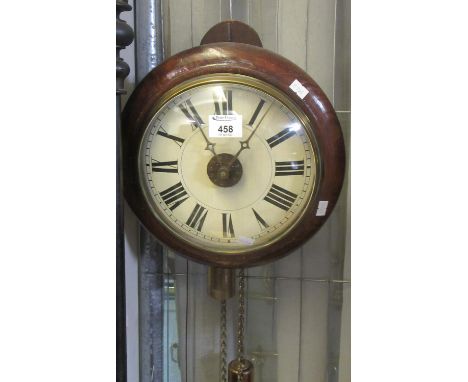 Late 19th century stained beech postmans alarm wall clock with painted Roman face. 22cm diameter approximately.(B.P. 21% + VA