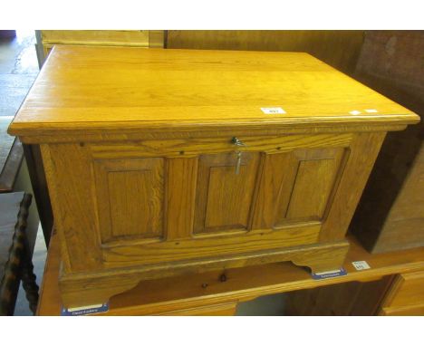 18th century style pale oak coffwr bach, having three fielded panels on a projecting base and bracket feet (with key). 67 x 4