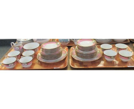 Two trays of 'Kokura' Japan part tea ware decorated in gilt and pink on a white ground with pink roses and vignettes to inclu
