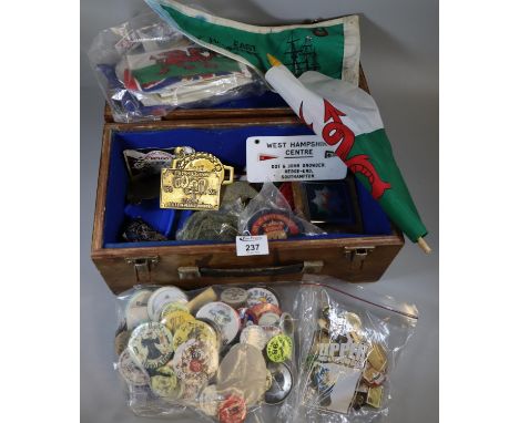 Wooden box containing assorted motorcycle ephemera to include brass and other badges, Norfolk, Devon, Hampshire, enamel bade,