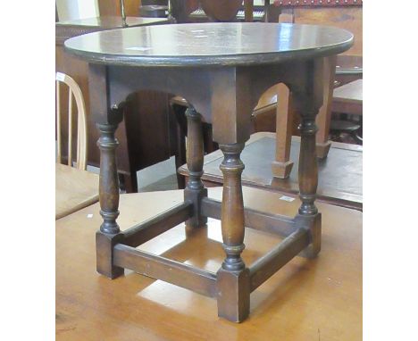 Edwardian mahogany octagonal occasional/centre table on fluted supports with under tier and shaped legs and castors, together