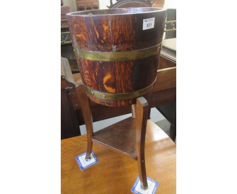 R. A. Lister & co. ltd. oak coopered brass banded jardiniere on stand.(B.P. 21% + VAT) 