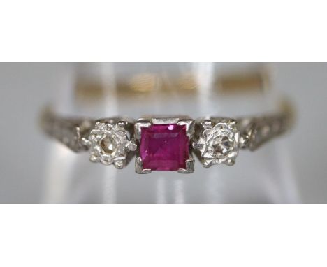 An 18ct gold platinum mounted ruby and diamond ring.  Ring size P.  Approx weight 2.5 grams.(B.P. 21% + VAT) 