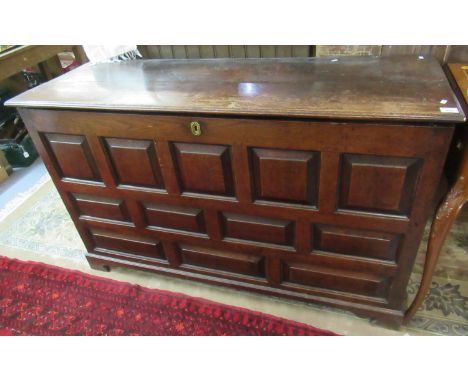 18th century Welsh oak coffer having twelve square and rectangular fielded and moulded panels, standing on shaped bracket fee