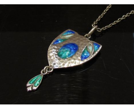 An Art Nouveau silver and enamel pendant necklace by James Fenton 1908, hammered silver front, 4.5cm drop, chain 40cm