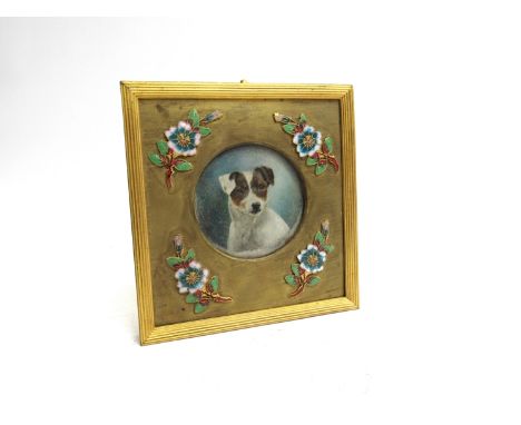 A Victorian enamel and ormolu frame with image of a Jack Russell, 12cm x 11.5cm