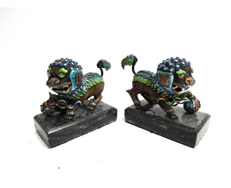 A pair of miniature dogs of fo figures with bright enamel detail, 10cm long