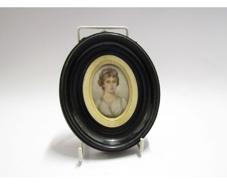 A 19th Century miniature portrait of aristocratic female, wearing white silk dress, oval frame, 7cm tall