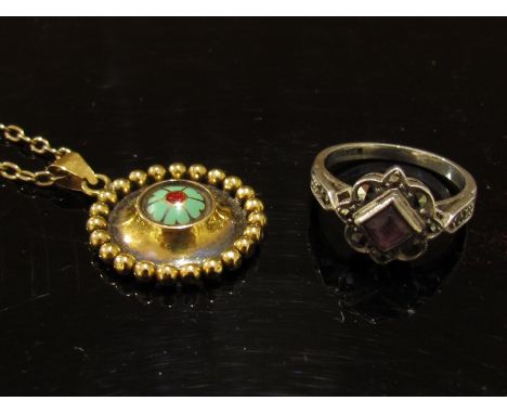 A gold chain stamped 9c, 46cm long hung with circular pendant with central enamel detail unmarked. Size L, 6.3g and a silver 