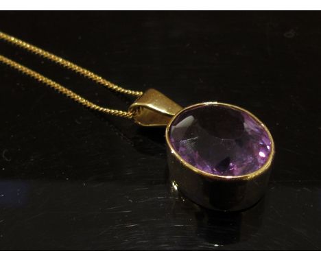 A 9ct gold pendant set with faceted amethyst stone on fine 9ct gold chain, 48cm long, 8g total