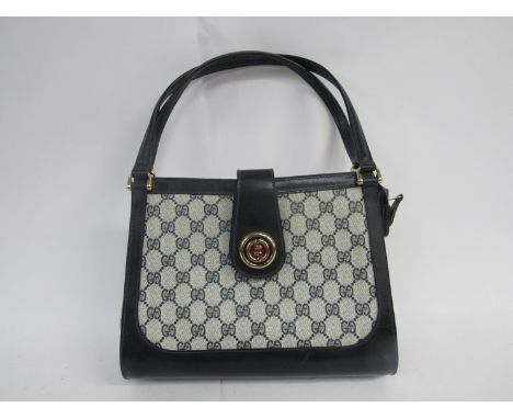 GUCCI  BREVETTATO GG vintage monogram double handle handbag. This 1970's collectable bag is a true testament to this iconic b