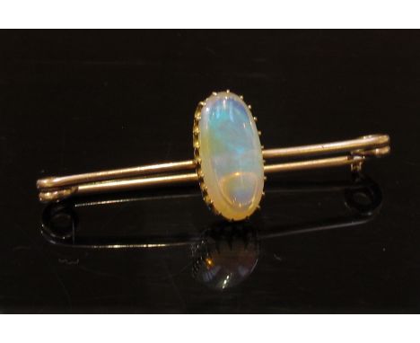 An Edwardian (1903) opal and 9ct rose gold bar brooch, 16mm x 8mm opal, 4.4g