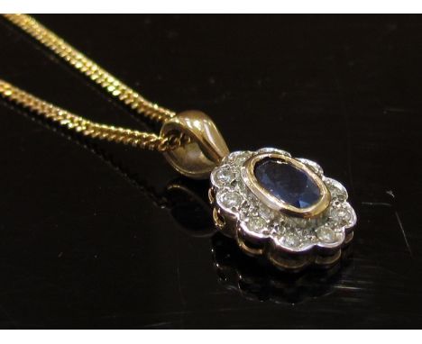 A 9ct gold sapphire and diamond pendant hung on 9ct gold chain, 46cm long, 3.5g