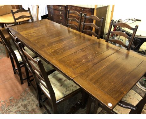 ERCOL OAK DRAWER LEAF REFECTORY DINING TABLE AND EIGHT LADDER BACK CHAIRS (SIX STANDARD AND TWO ELBOW CHAIRS) 213CM X 83CM AP