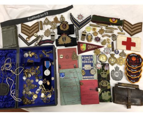 BOX CONTAINING VARIOUS SEW ON MILITARY AND SERVICE BADGES, MILITARY RELATED PAMPHLETS, VARIOUS WHISTLES, MILITARY CAP BADGES,