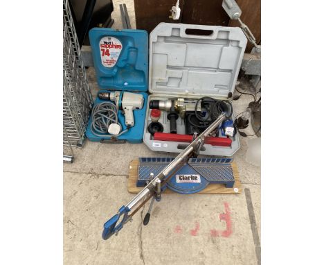 AN ASSORTMENT OF TOOLS TO INCLUDE AN ELECTRICE SDS DRILL AND A MITRE SAW ETC 