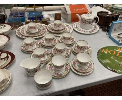 A LARGE QUANTITY OF ROYAL WORCESTER 'ROYAL GARDEN' TEAWARE TO INCLUDE A TEAPOT, PLATES, CUPS, SAUCERS, SIDE PLATES, A CREAM J