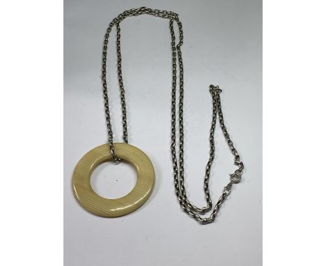 A LONG SILVER BELCHER CHAIN AND BONE RING 