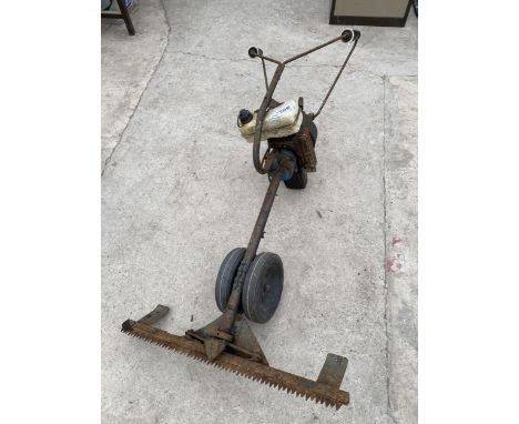 A VINTAGE PETROL ENGINE PUSH ALONG FINGER MOWER 