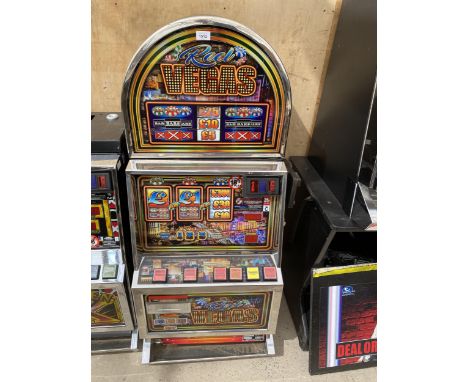 THE TOP HALF OF A REEL VEGAS FRUIT MACHINE 