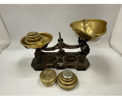A VINTAGE SET OF WEIGHING SCALES AND BRASS WEIGHTS 
